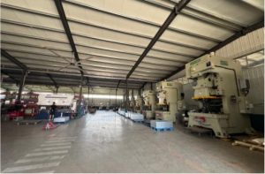 custom stainless steel parts manufacturer factory floor