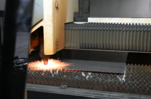 Fiber laser cutting stainless steel sheet with sparks