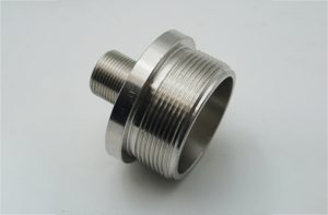 Machined stainless steel threaded fitting